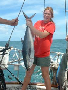Emily with the fish she caught in Great Barrier Reef, Australia