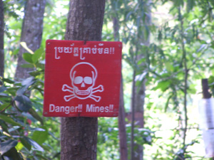 A sign in Siem Reap, Cambodia, warning of land mines